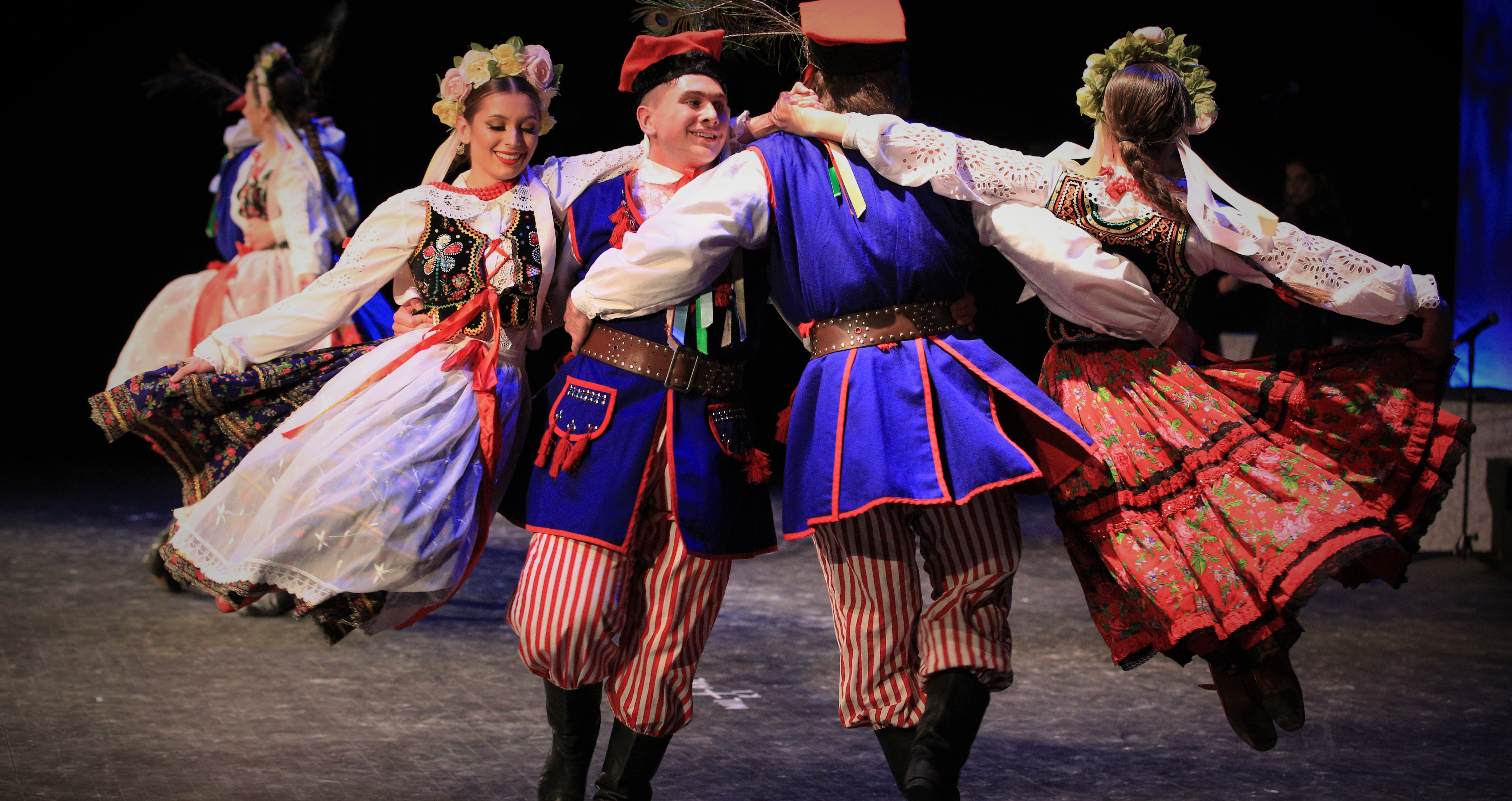 Lively Polish dancers spinning to the sounds of the Kraków region.